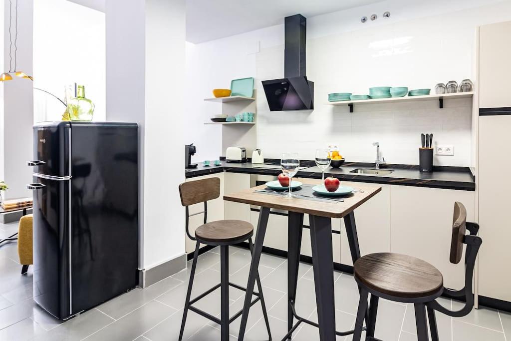 Kuchyňa alebo kuchynka v ubytovaní Caramba FreshApartments
