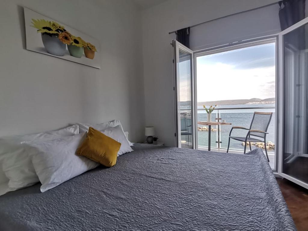 Postel nebo postele na pokoji v ubytování Apartments Benic