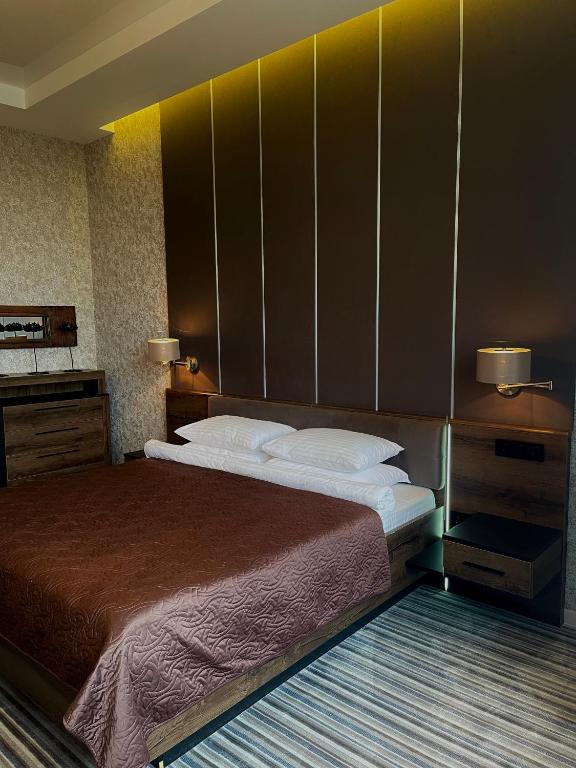 Postel nebo postele na pokoji v ubytování Villa-Sofia Mini-hotel