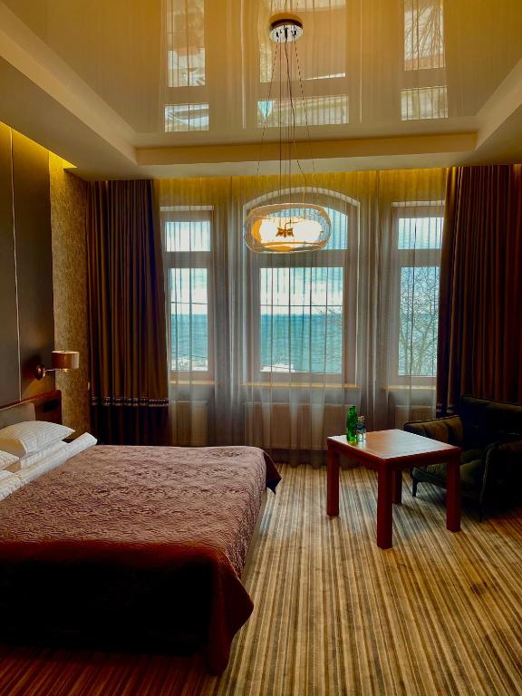 Postel nebo postele na pokoji v ubytování Villa-Sofia Mini-hotel