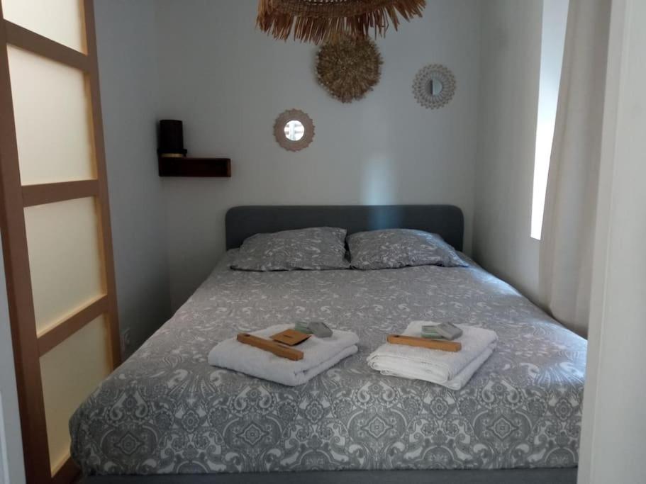Posteľ alebo postele v izbe v ubytovaní Bienvenue chez vous