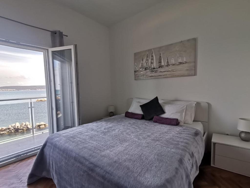 Postel nebo postele na pokoji v ubytování Apartments Benic