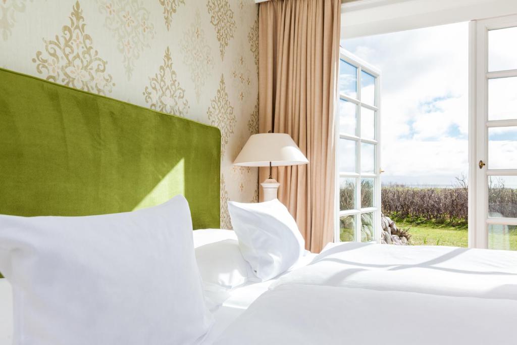 Postel nebo postele na pokoji v ubytování Hotel Watthof