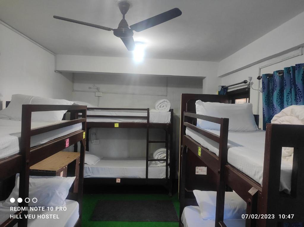 Postel nebo postele na pokoji v ubytování Hill Veu Home Bir Billing