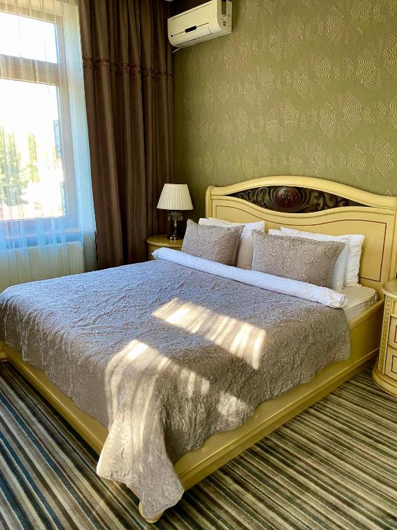 Postel nebo postele na pokoji v ubytování Villa-Sofia Mini-hotel