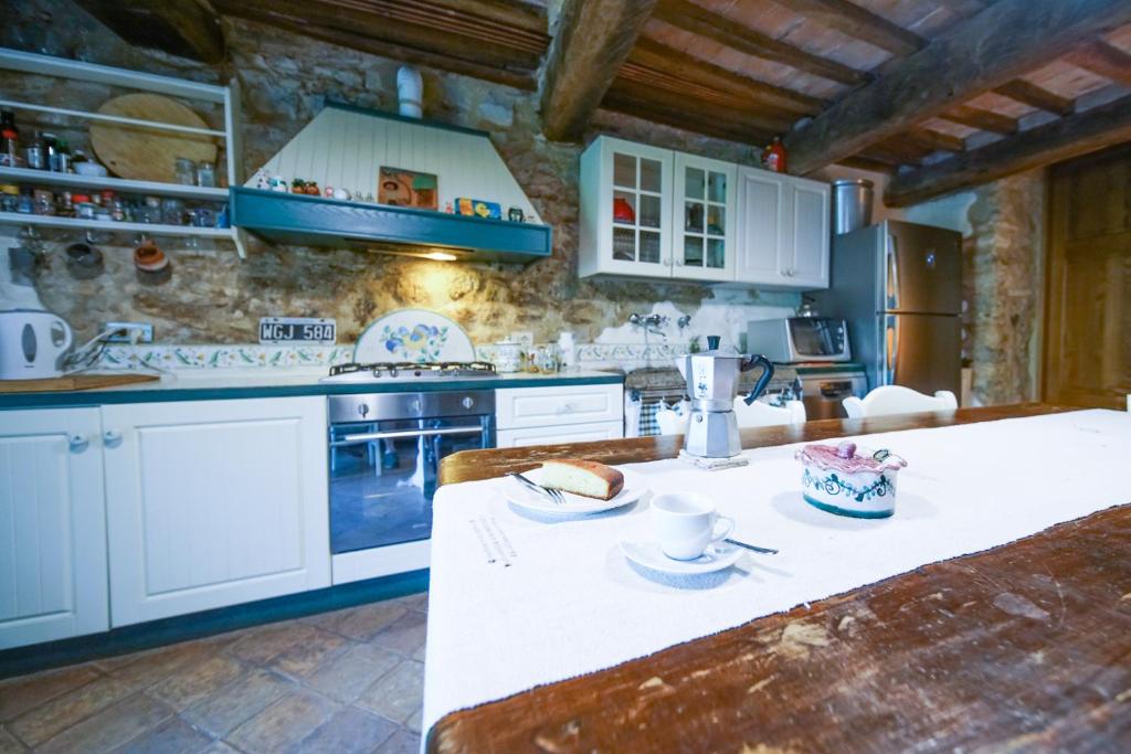 Kuchyň nebo kuchyňský kout v ubytování Agriturismo La Colombella