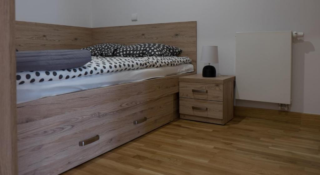 Posteľ alebo postele v izbe v ubytovaní Apartament Wiślany Sen