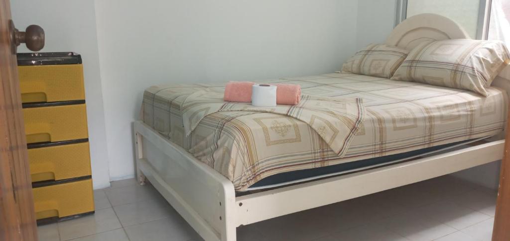 Postel nebo postele na pokoji v ubytování OCEANSURF hosteria