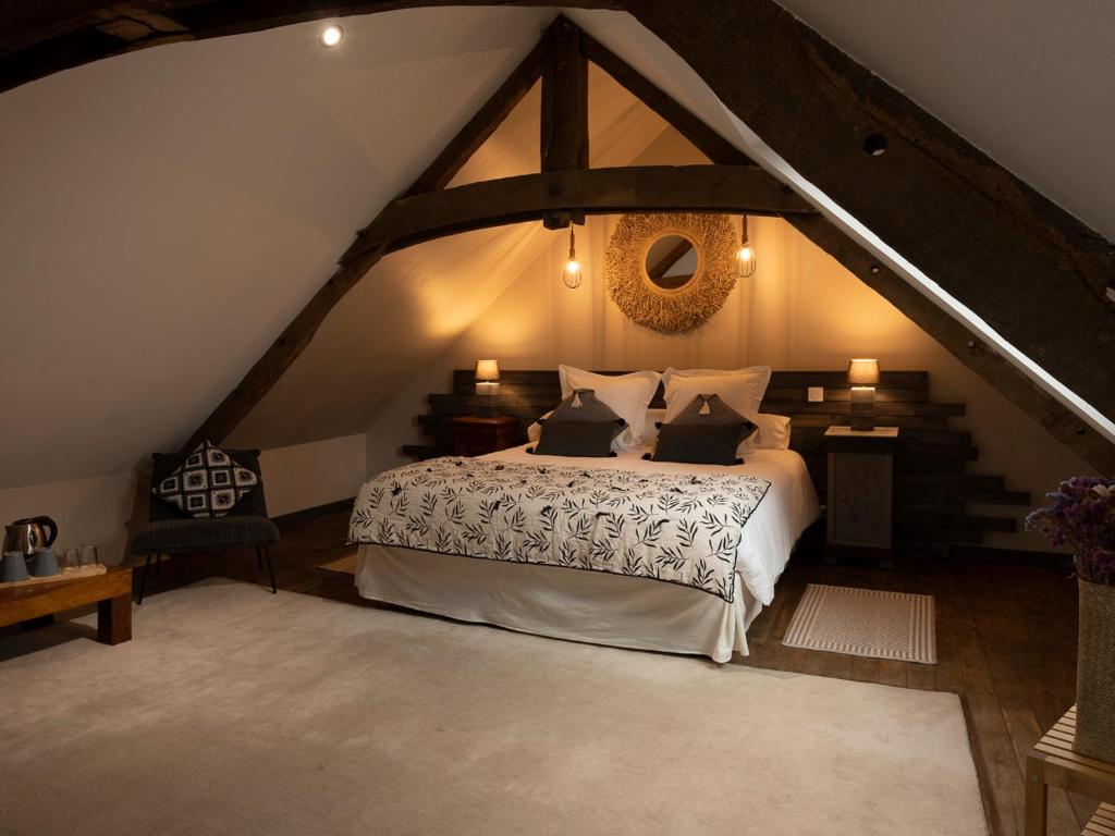 Postel nebo postele na pokoji v ubytování Domaine du Kelenn, Maison d'hôtes de charme avec piscine
