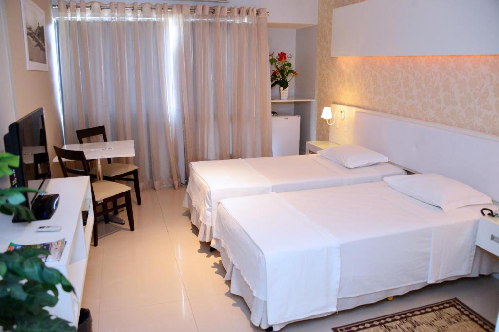 Postel nebo postele na pokoji v ubytování Bahiamar Hotel