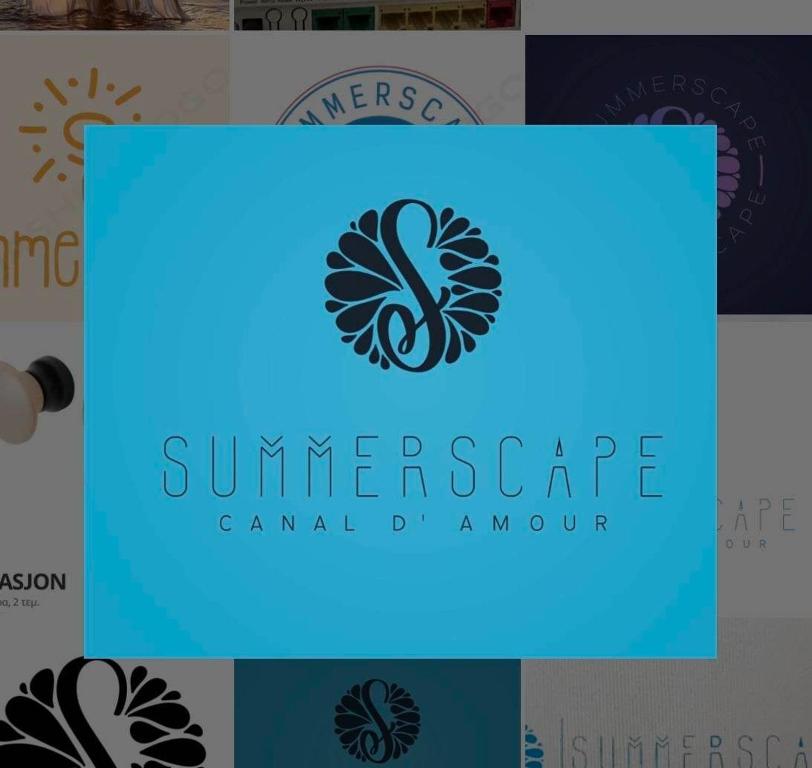 un logo di una società di campeggio con una luce blu di Summerscape Studios and Apartments a Città di Corfù