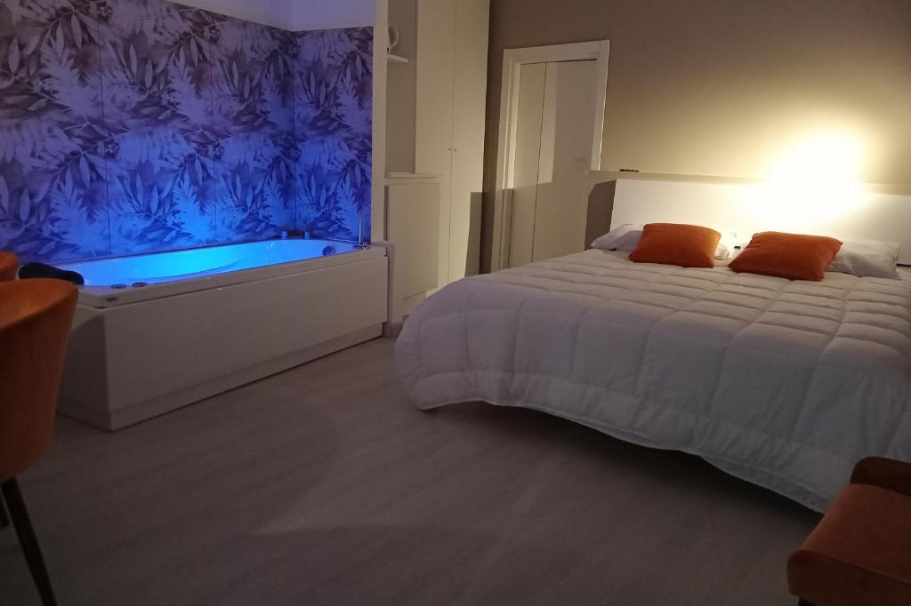 Postel nebo postele na pokoji v ubytování Narciso boutique apartment