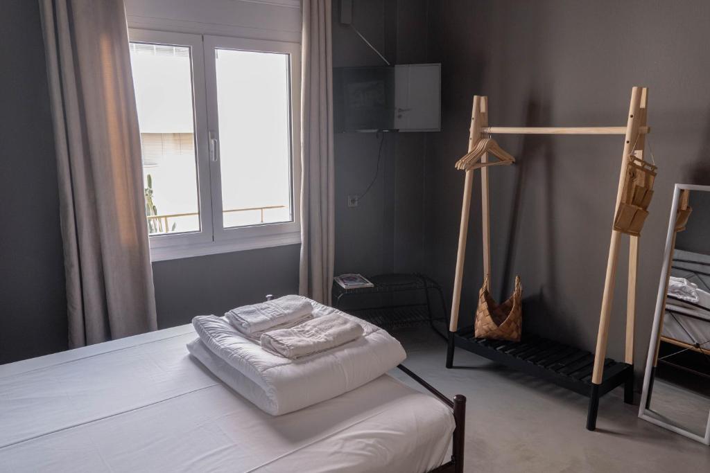 Postel nebo postele na pokoji v ubytování So Young Hostel
