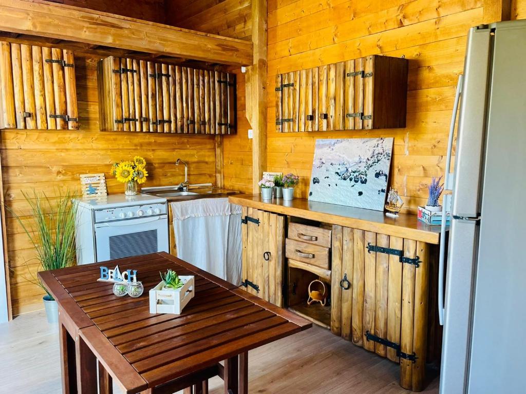 Kuchyň nebo kuchyňský kout v ubytování Camping Torre Mucchia