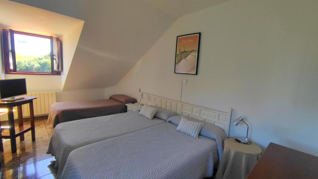 Cama o camas de una habitación en Hotel Solatorre
