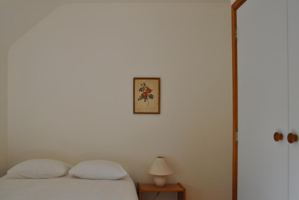 Postel nebo postele na pokoji v ubytování Petit château de Beauplateau