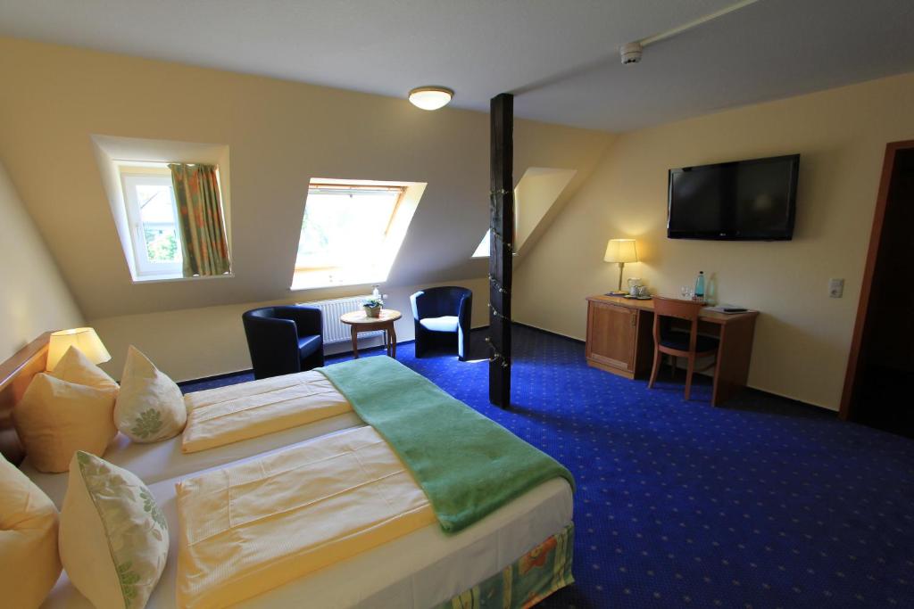 Postel nebo postele na pokoji v ubytování Residenzia Hotel Grenadier