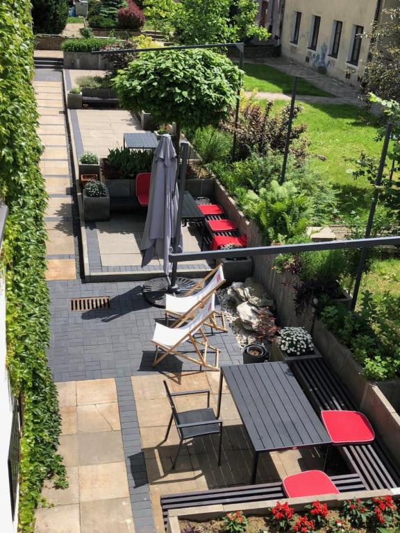 Vonkajšia záhrada v ubytovaní Hotel77