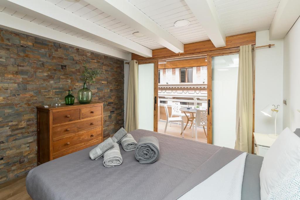 Posteľ alebo postele v izbe v ubytovaní Loft con terraza centro Valencia