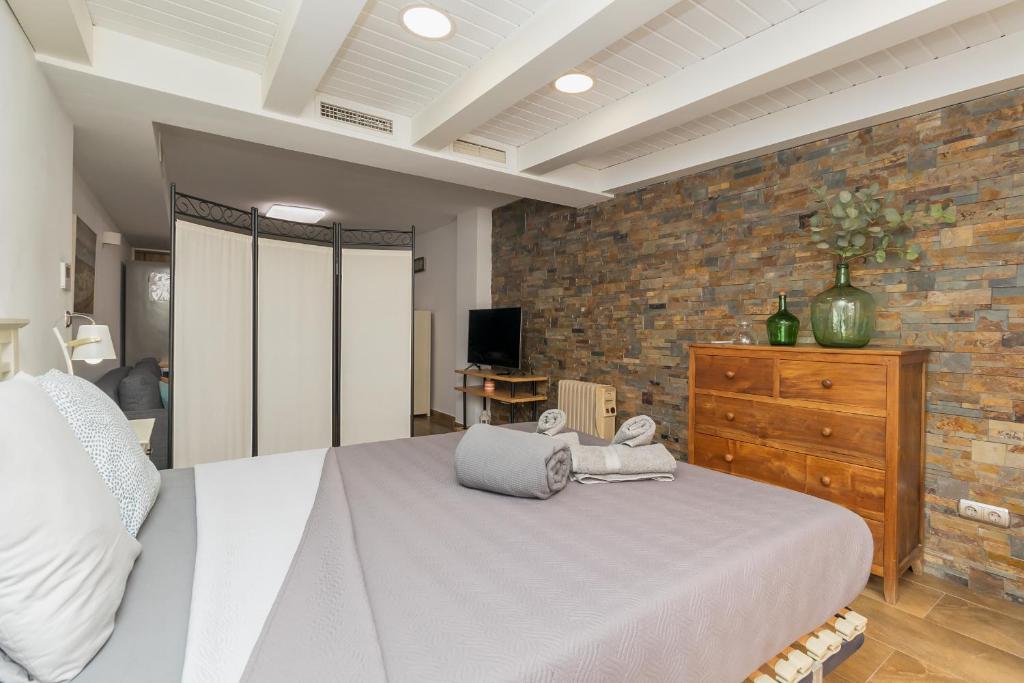 Posteľ alebo postele v izbe v ubytovaní Loft con terraza centro Valencia