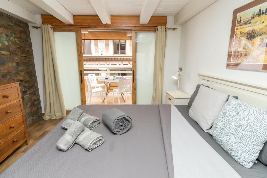 Posteľ alebo postele v izbe v ubytovaní Loft con terraza centro Valencia