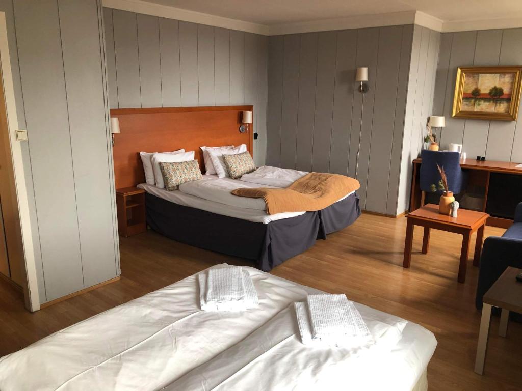 Katil atau katil-katil dalam bilik di Horten Budget Hotel