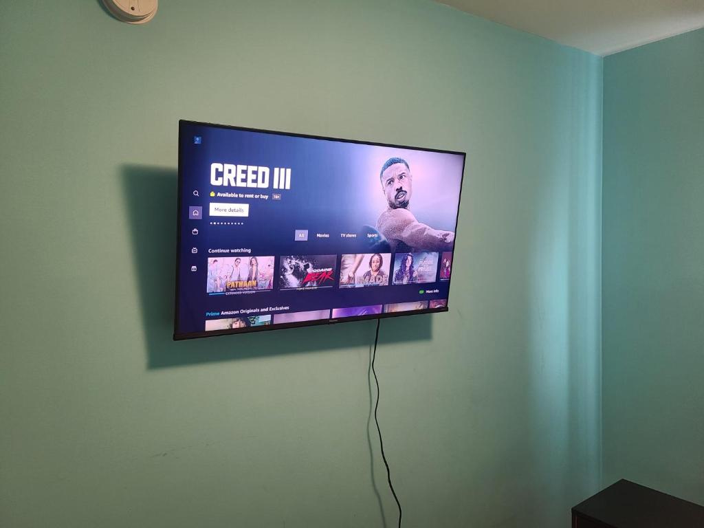 TV a/nebo společenská místnost v ubytování Winnipeg Peace Home