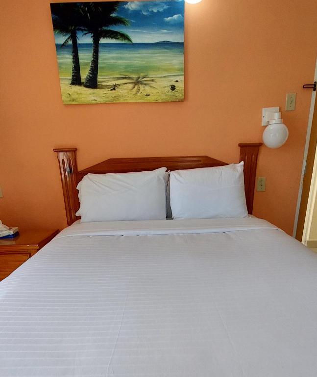 Postel nebo postele na pokoji v ubytování Seaview Beach Hotel