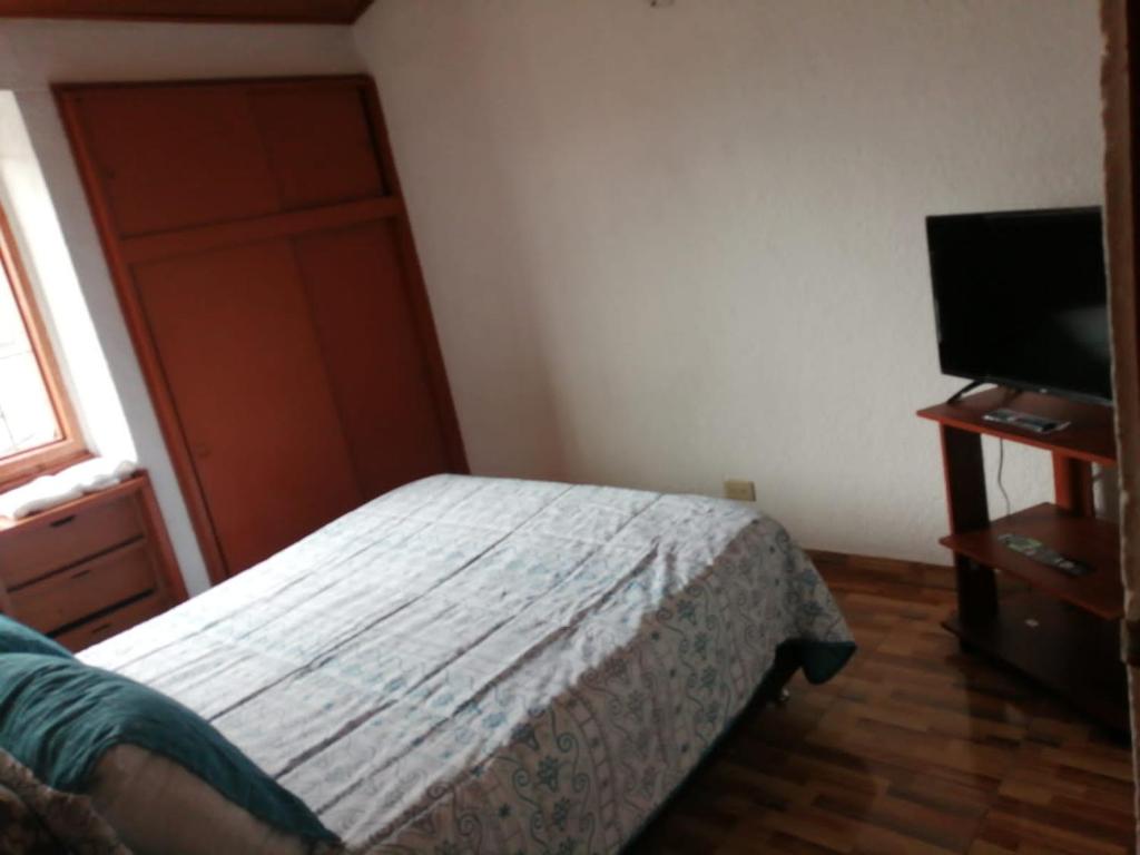 TV a/nebo společenská místnost v ubytování Claudiae
