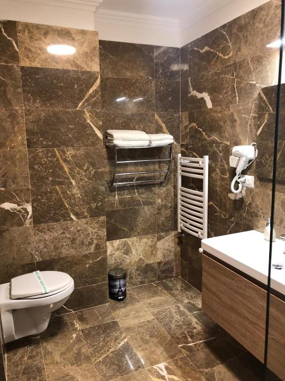Koupelna v ubytování Hotel Yarus Plus
