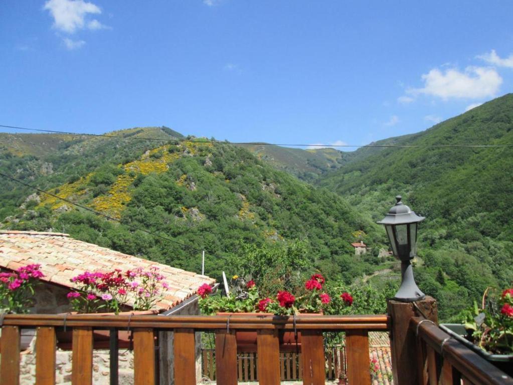 a balcony with a view of a mountain at LE MYRO in Péreyres