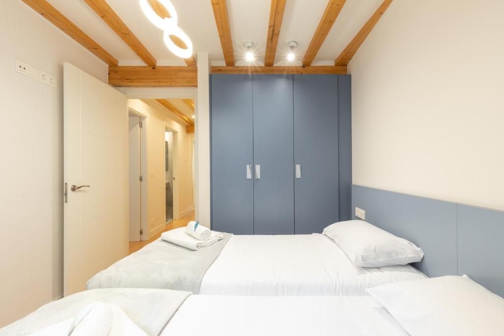 Postel nebo postele na pokoji v ubytování Gamarra - baskeyrentals