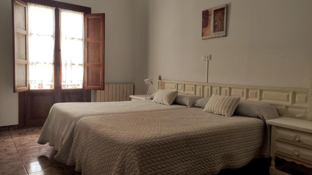 Cama o camas de una habitación en Hotel Solatorre