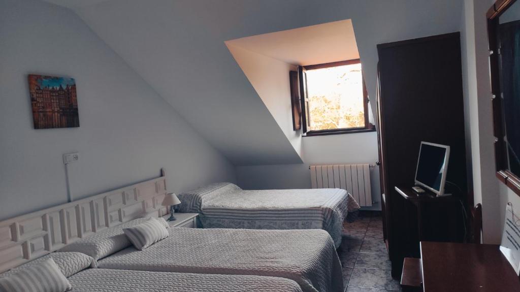 Cama o camas de una habitación en Hotel Solatorre