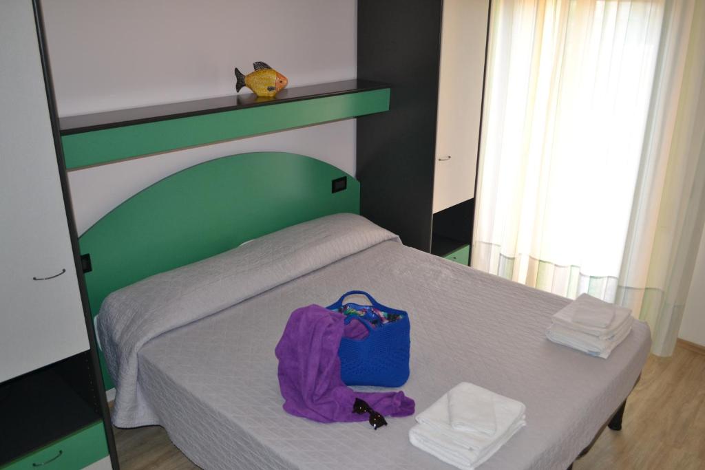 Postel nebo postele na pokoji v ubytování Hotel Tre Stelle