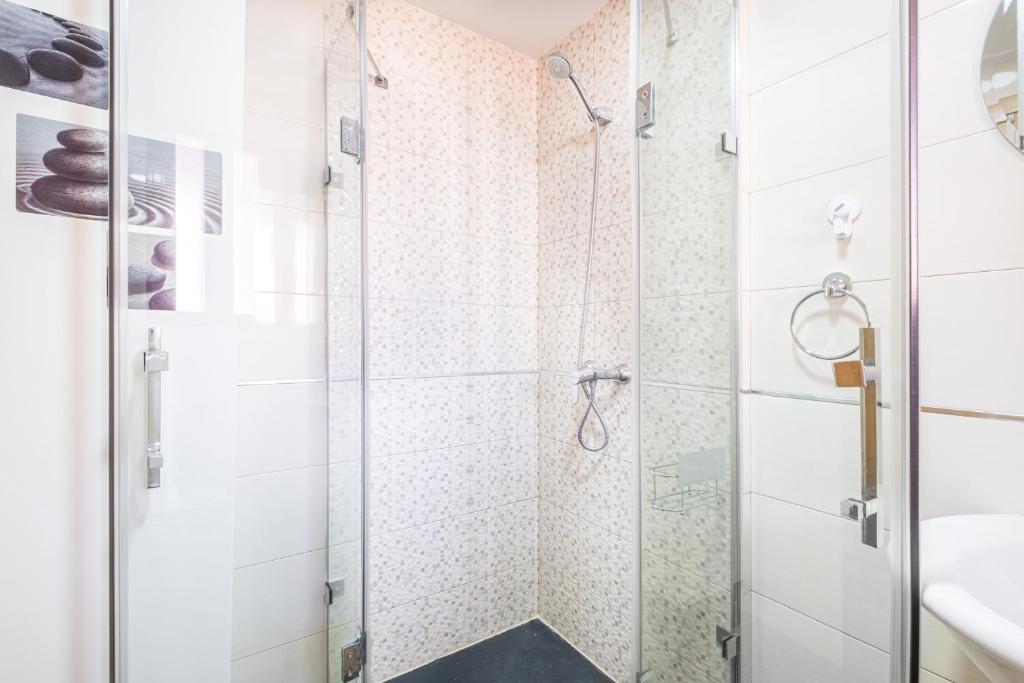 Koupelna v ubytování Loix Mar Apartment 2-F Levante Beach