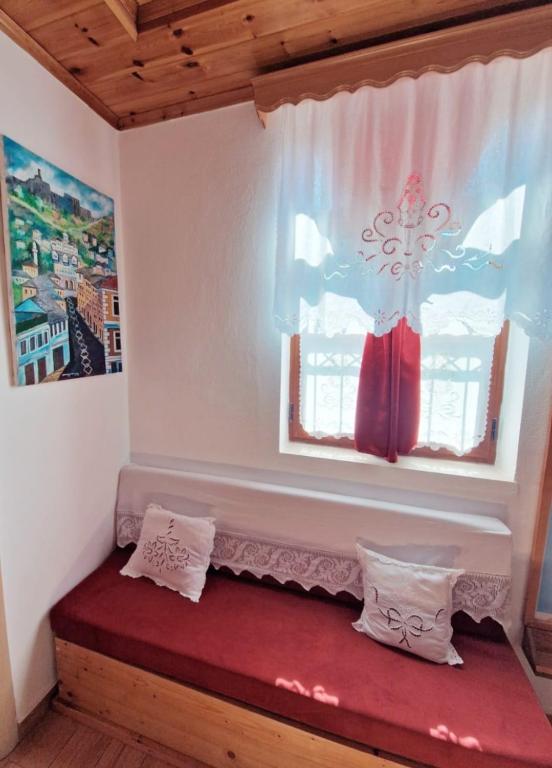 Postel nebo postele na pokoji v ubytování Hotel Domino