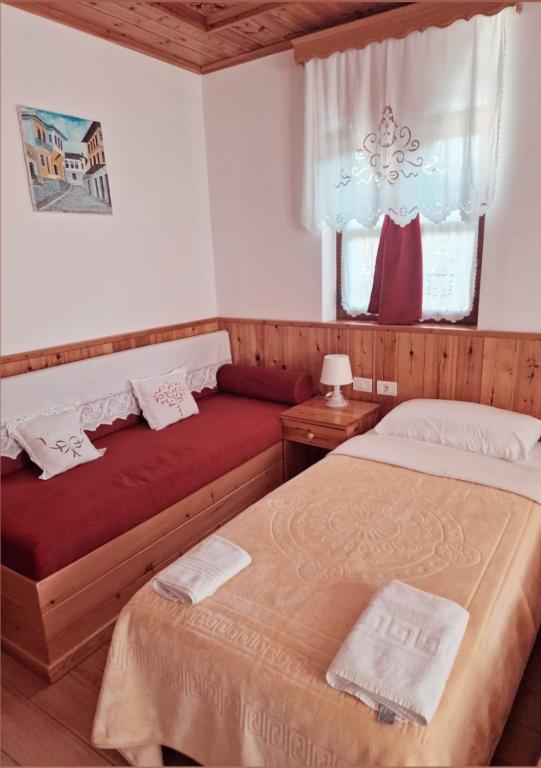 Postel nebo postele na pokoji v ubytování Hotel Domino
