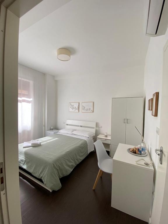 Postel nebo postele na pokoji v ubytování Domus Corso Umberto 18 B&B