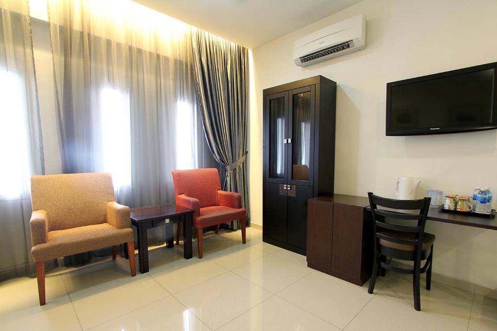 TV a/nebo společenská místnost v ubytování Hotel JSL
