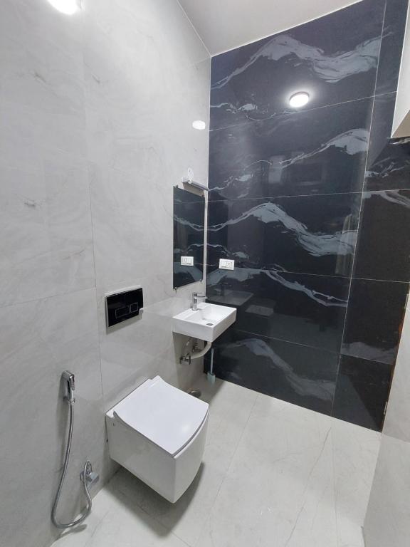 Koupelna v ubytování Kodai Diva Inn - Home Stay