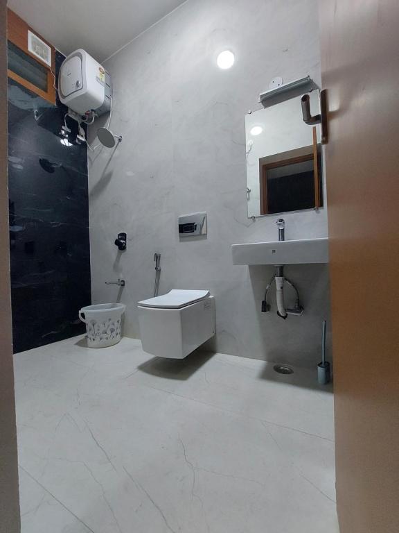 Koupelna v ubytování Kodai Diva Inn - Home Stay