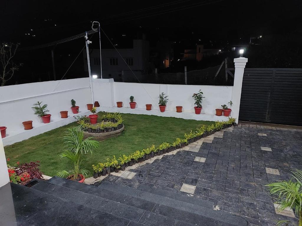 Zahrada ubytování Kodai Diva Inn - Home Stay