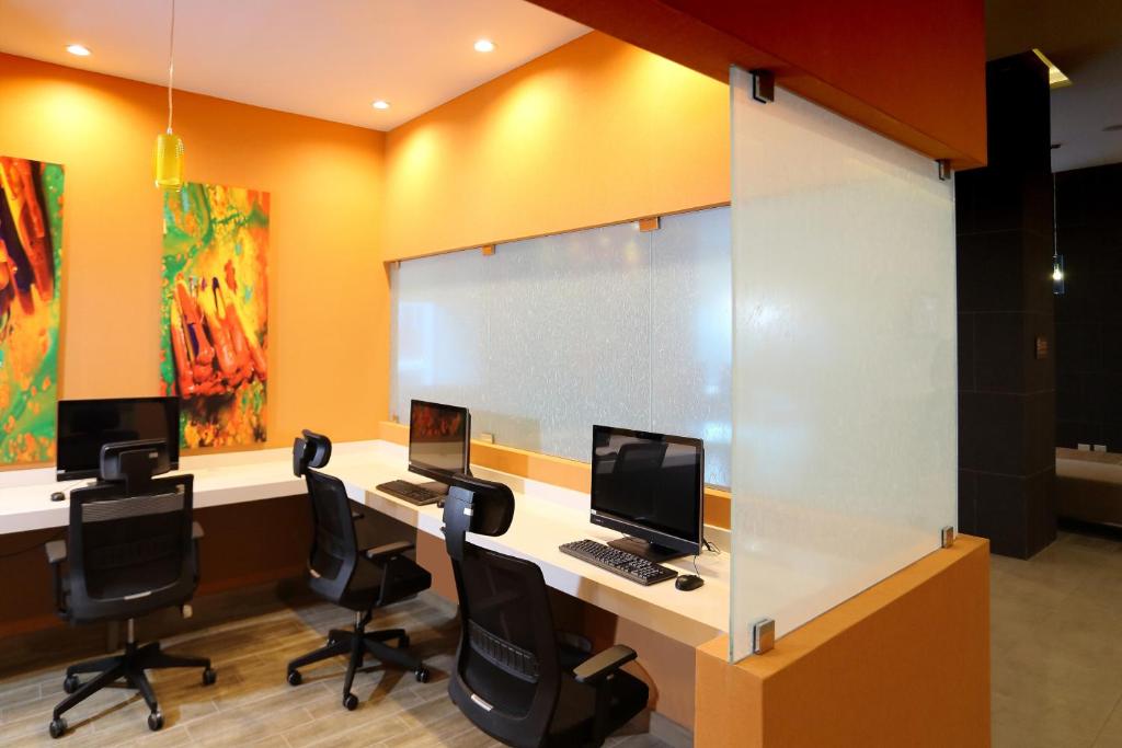 Uma televisão e/ou sistema de entretenimento em Hyatt Place Tegucigalpa