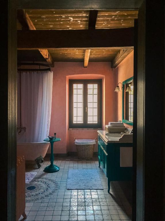 Postel nebo postele na pokoji v ubytování B&B Cascina Mattarelle