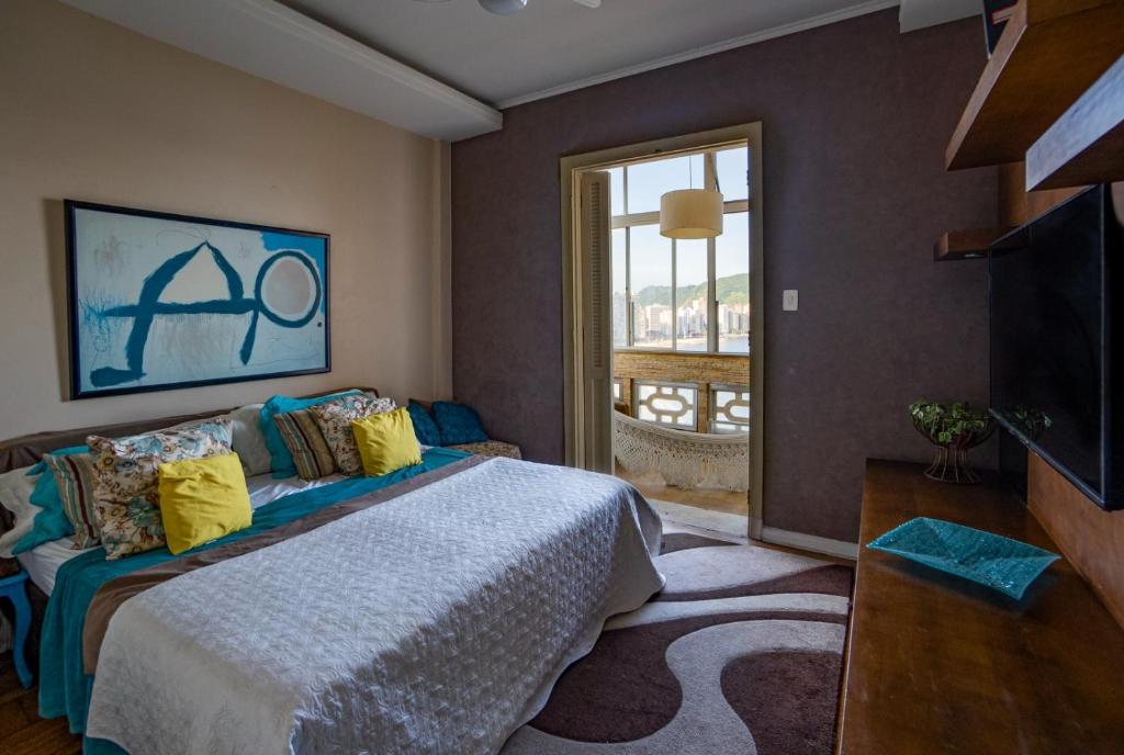 Llit o llits en una habitació de Apartamento pé na areia