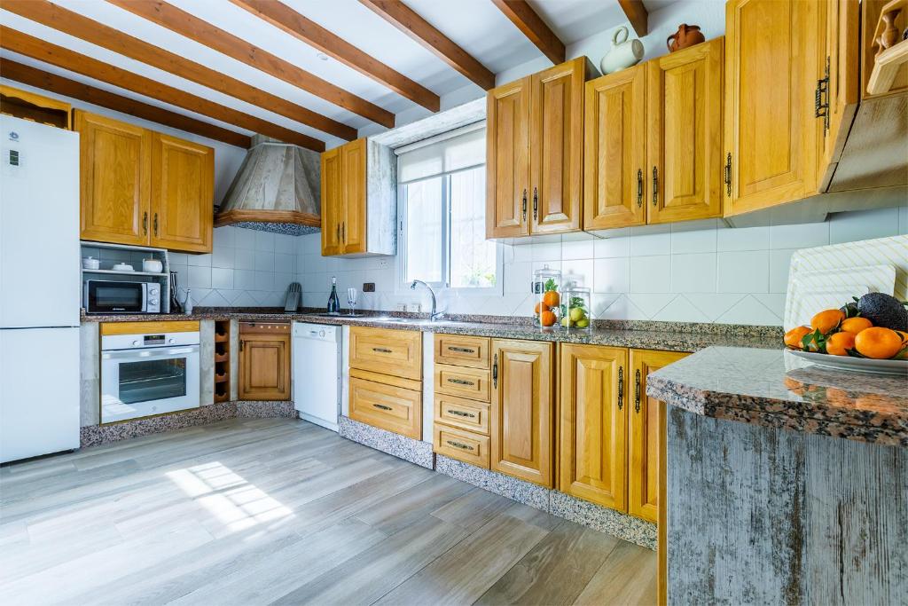 Kuchyňa alebo kuchynka v ubytovaní Villa la Orilla