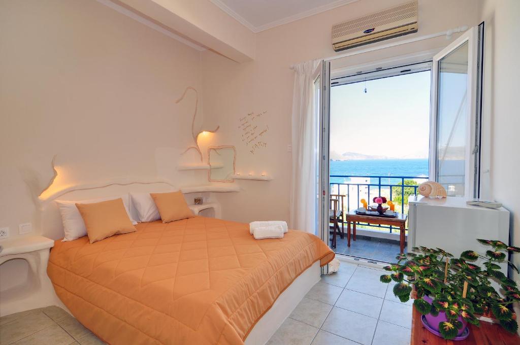 Postel nebo postele na pokoji v ubytování Panorama Hotel