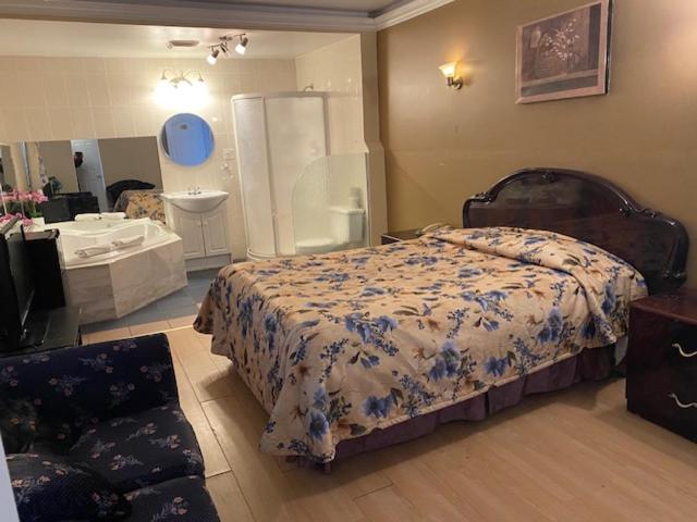 Postel nebo postele na pokoji v ubytování Motel Pierre
