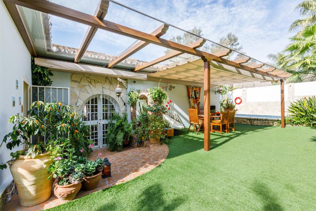 Vonkajšia záhrada v ubytovaní Villa la Orilla